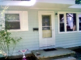Exterior white house and trim painting job