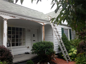 Full Color Painting picture of house siding refresh job during preparation for painting